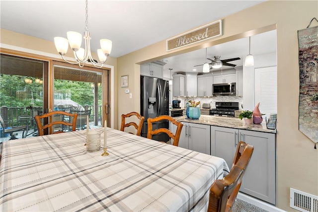 315 Yarrow Ln, Pleasant Hills, PA 15236 - dining room with a chandelier and a ceiling fan