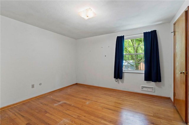 455 Darrell Dr, Penn Hills, PA 15235 - spare room with light wood-type flooring and baseboards