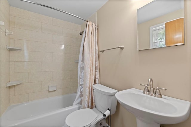 455 Darrell Dr, Penn Hills, PA 15235 - bathroom featuring toilet, shower / bath combo, and a sink