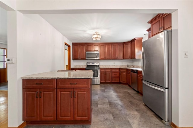 455 Darrell Dr, Penn Hills, PA 15235 - kitchen with stainless steel appliances, a peninsula, light stone counters, brown cabinets, and a sink