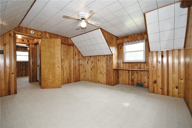 3743 Grant St, Castle Shannon, PA 15234 - additional living space featuring carpet floors, plenty of natural light, lofted ceiling, wood walls, and a ceiling fan