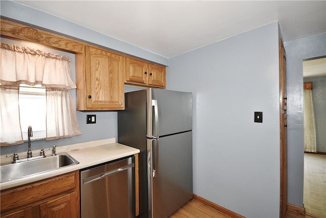 3743 Grant St, Castle Shannon, PA 15234 - kitchen with appliances with stainless steel finishes, a sink, light countertops, and baseboards