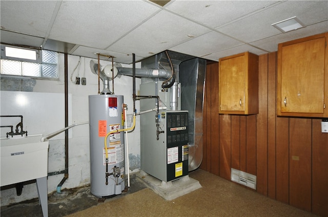 3743 Grant St, Castle Shannon, PA 15234 - utility room with water heater, heating unit, and a sink