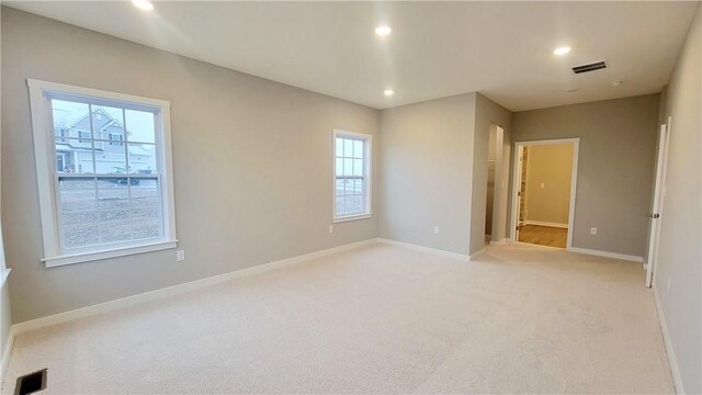 168 Twin Oaks Dr, Buffalo Twp, PA 16055 - empty room with light colored carpet and recessed lighting