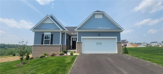 168 Twin Oaks Dr, Buffalo Twp, PA 16055 - view of front facade featuring board and batten siding, driveway, a front yard, and an attached garage