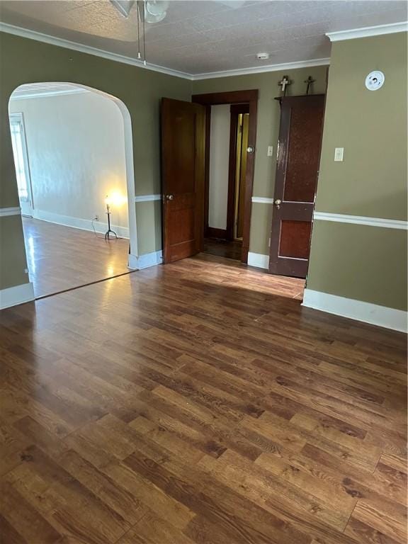 1810 Ridge Ave, Arnold, PA 15068 - empty room featuring arched walkways, wood finished floors, crown molding, and ceiling fan