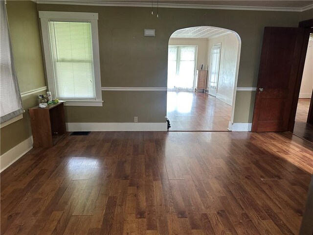 1810 Ridge Ave, Arnold, PA 15068 - unfurnished room with arched walkways, wood finished floors, and crown molding