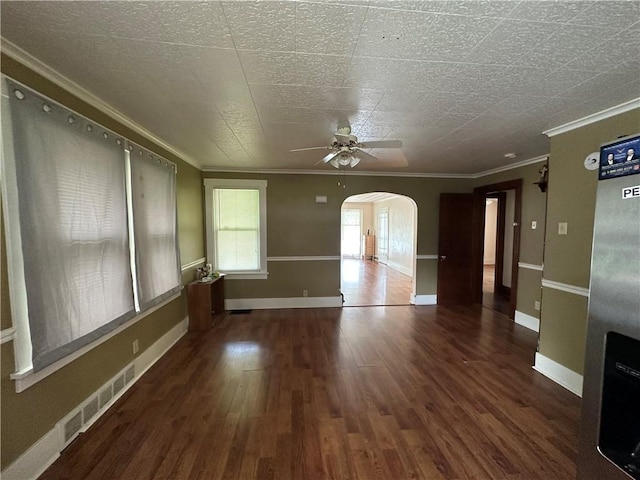 1810 Ridge Ave, Arnold, PA 15068 - empty room featuring arched walkways, ceiling fan, wood finished floors, and crown molding