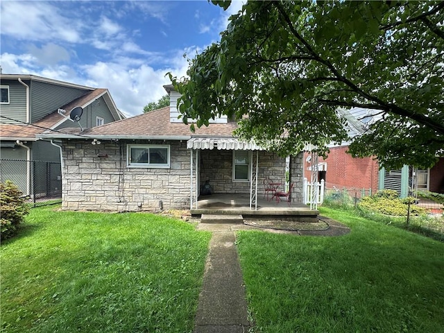 1810 Ridge Ave, Arnold, PA 15068 - view of front of property with stone siding, roof with shingles, and a porch