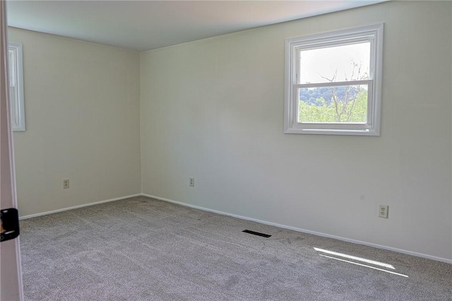 2678 Elaine Dr, Lower Burrell, PA 15068 - empty room with carpet floors and baseboards