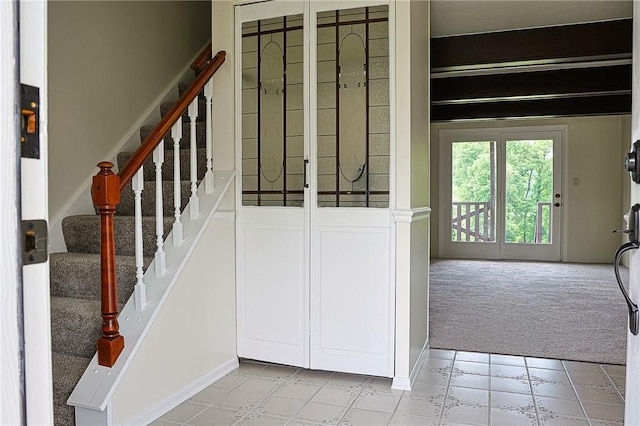 2678 Elaine Dr, Lower Burrell, PA 15068 - stairs featuring carpet and tile patterned flooring