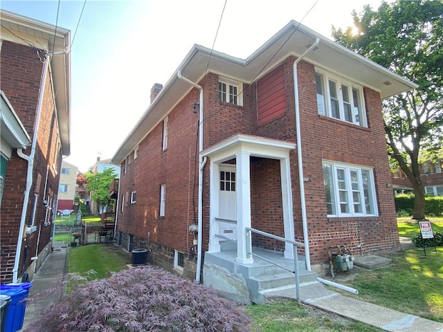 970 Lilac St, Greenfield, PA 15217 - view of side of property featuring brick siding and a chimney