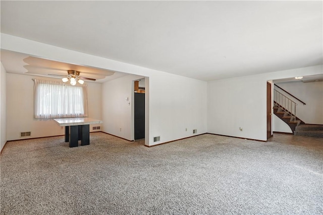 413 Stilley Rd, Jefferson Hills, PA 15025 - unfurnished living room with stairway, light carpet, and baseboards