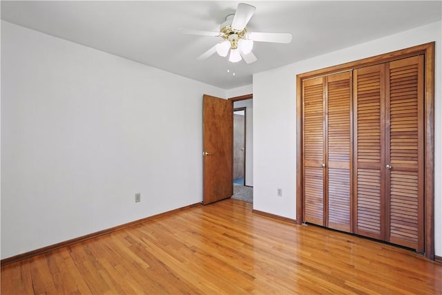 413 Stilley Rd, Jefferson Hills, PA 15025 - unfurnished bedroom featuring baseboards, light wood finished floors, a closet, and a ceiling fan