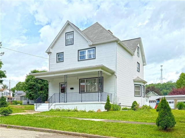 419 Washington Ave, Leechburg Boro, PA 15656 - view of front of house with a porch, roof with shingles, and a front yard