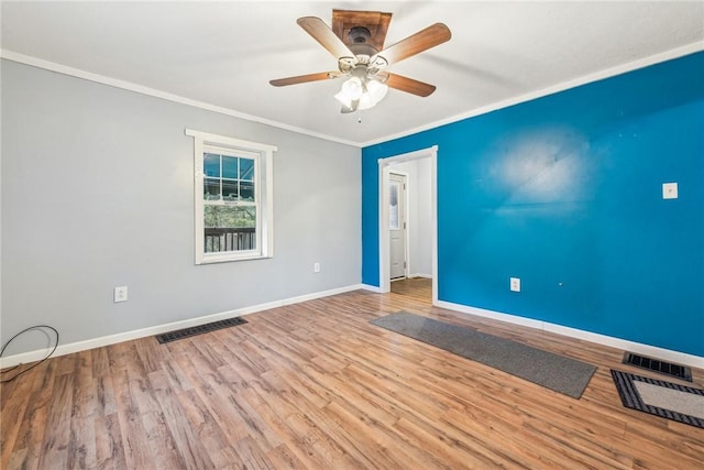 316 Dutchman Run Rd, Lower Burrell, PA 15068 - unfurnished room with baseboards, ornamental molding, wood finished floors, and a ceiling fan