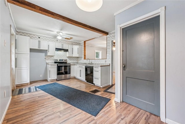 316 Dutchman Run Rd, Lower Burrell, PA 15068 - kitchen with electric range, dishwasher, under cabinet range hood, light countertops, and beam ceiling