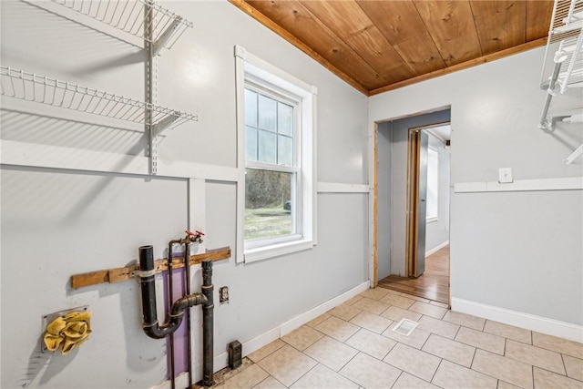 316 Dutchman Run Rd, Lower Burrell, PA 15068 - interior space featuring wood ceiling, baseboards, light tile patterned floors, and crown molding