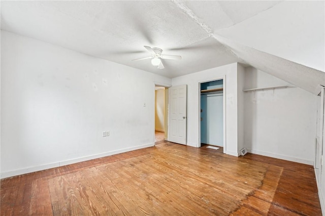 316 Dutchman Run Rd, Lower Burrell, PA 15068 - unfurnished bedroom featuring light wood-style flooring, baseboards, and a ceiling fan