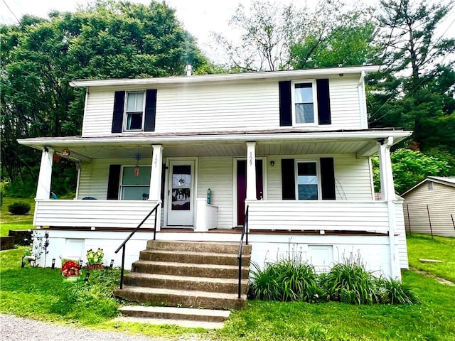 127 Tipple Row Rd, Hempfield Twp Wml, PA 15601 - view of front of house featuring covered porch and a front lawn