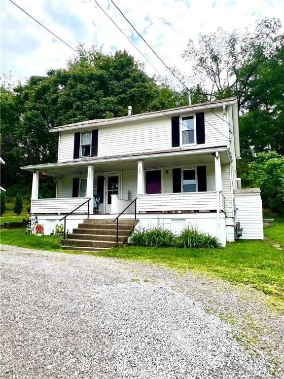 127 Tipple Row Rd, Hempfield Twp Wml, PA 15601 - view of front of property with a porch and gravel driveway