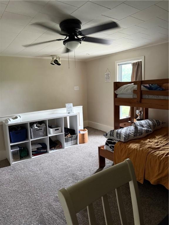 127 Tipple Row Rd, Hempfield Twp Wml, PA 15601 - bedroom with carpet floors, a ceiling fan, and baseboards