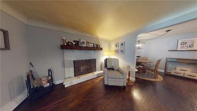 2819 Glenmore, Dormont, PA 15216 - sitting room featuring wood finished floors, baseboards, and a fireplace