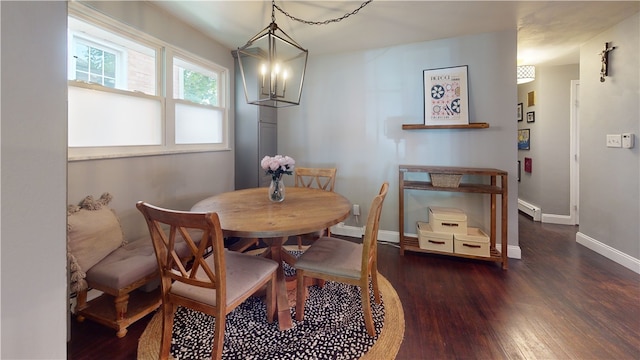 2819 Glenmore, Dormont, PA 15216 - dining area with wood finished floors, a chandelier, a baseboard heating unit, and baseboards