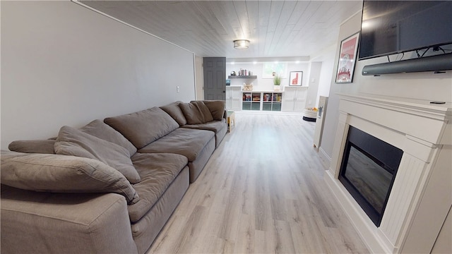 2819 Glenmore, Dormont, PA 15216 - living room with light wood finished floors and a glass covered fireplace
