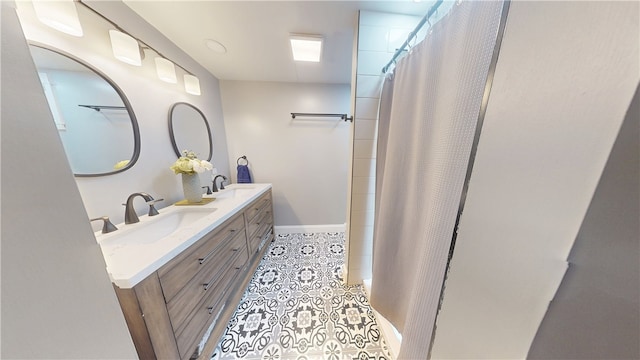 2819 Glenmore, Dormont, PA 15216 - full bathroom with double vanity, tile patterned flooring, baseboards, and a shower with shower curtain
