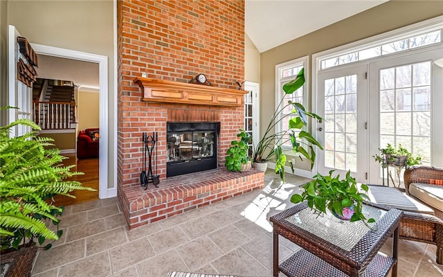 3124 Canterbury Dr, Hampton, PA 15101 - living area featuring high vaulted ceiling, a brick fireplace, and baseboards