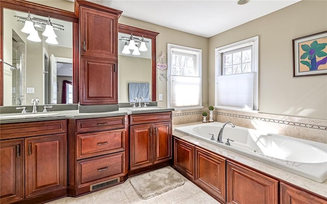 3124 Canterbury Dr, Hampton, PA 15101 - bathroom with double vanity, a jetted tub, and tile patterned flooring