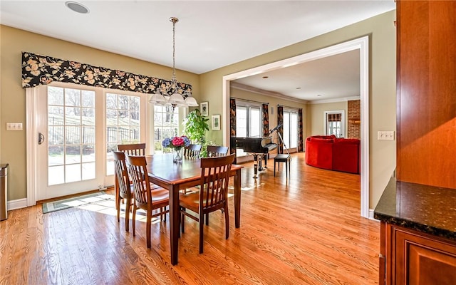3124 Canterbury Dr, Hampton, PA 15101 - dining area with a chandelier, light wood-style flooring, and baseboards