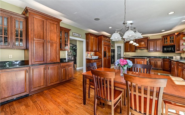 3124 Canterbury Dr, Hampton, PA 15101 - dining room featuring wood finished floors, a chandelier, and recessed lighting