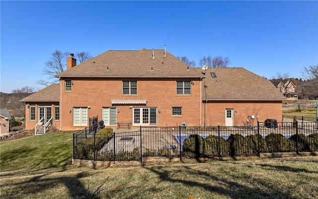 3124 Canterbury Dr, Hampton, PA 15101 - rear view of property featuring a chimney, brick siding, and entry steps