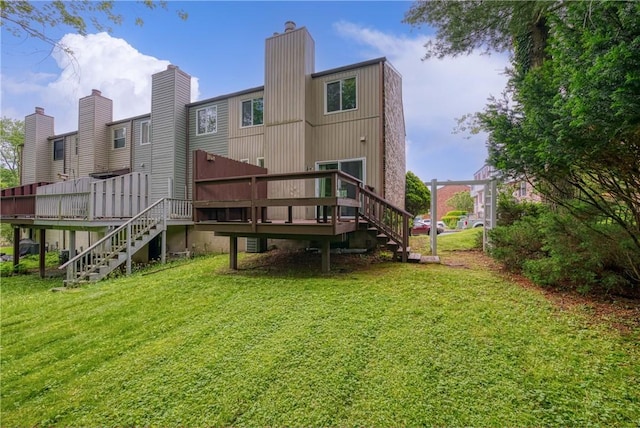 3131 Cheltenham Ct, Hampton, PA 15044 - back of property featuring stairway, a lawn, and a deck