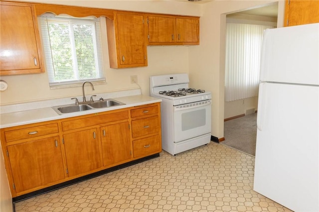 3183 Glendale Ave, Brentwood, PA 15227 - kitchen with white appliances, a sink, light countertops, and brown cabinets