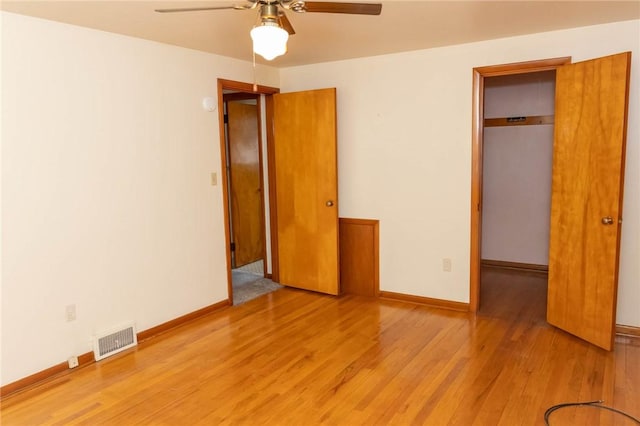 3183 Glendale Ave, Brentwood, PA 15227 - unfurnished bedroom featuring light wood finished floors, a closet, baseboards, ceiling fan, and a spacious closet