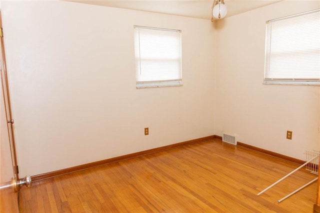 3183 Glendale Ave, Brentwood, PA 15227 - spare room with light wood-type flooring, baseboards, and radiator heating unit
