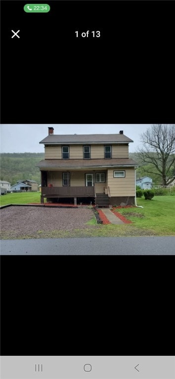 146 Back St, Quemahoning Twp, PA 15936 - view of front of house featuring a chimney