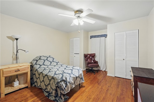 216 11th St, Sharpsburg, PA 15215 - bedroom with wood finished floors, ceiling fan, and baseboards