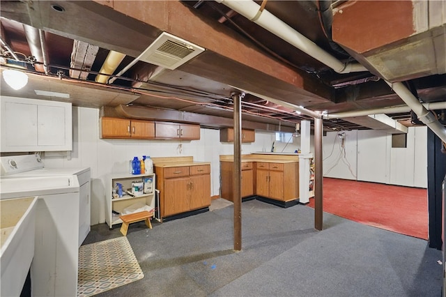 216 11th St, Sharpsburg, PA 15215 - unfinished below grade area with separate washer and dryer, a sink, and carpet floors