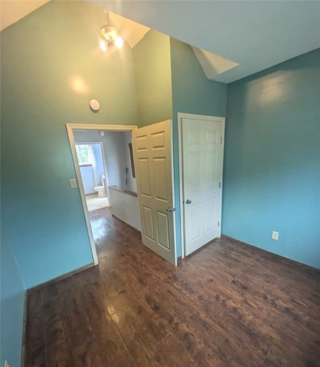 115 N Ray St, New Castle/3Rd, PA 16101 - unfurnished bedroom with dark wood-style floors and high vaulted ceiling