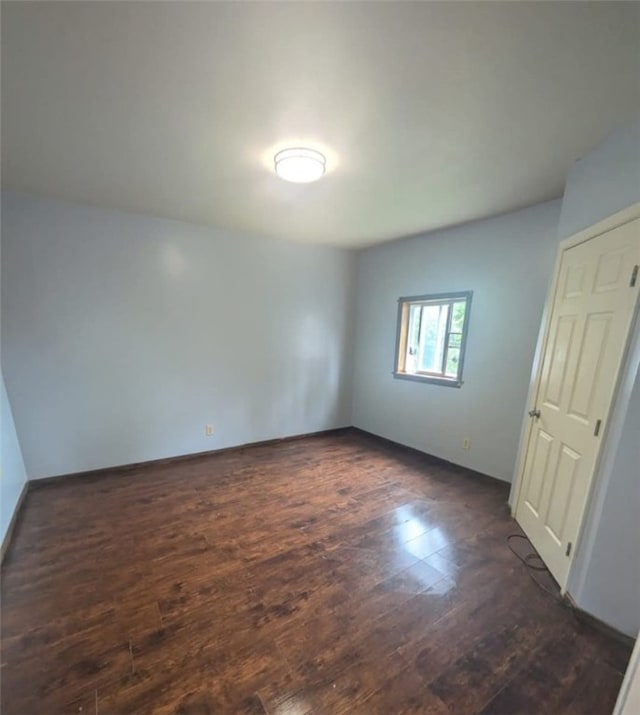 115 N Ray St, New Castle/3Rd, PA 16101 - unfurnished room featuring dark wood-type flooring and baseboards