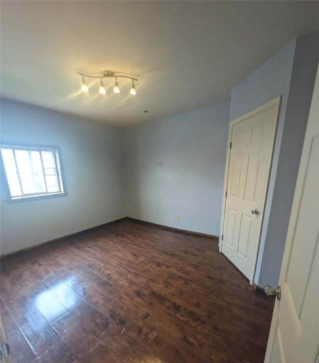 115 N Ray St, New Castle/3Rd, PA 16101 - spare room featuring dark wood finished floors and baseboards