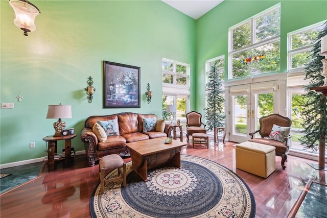 3532 Fairway Ct, Blairsville Area, PA 15717 - living area with a high ceiling, healthy amount of natural light, wood finished floors, and baseboards