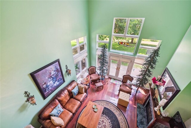 3532 Fairway Ct, Blairsville Area, PA 15717 - living area featuring french doors, a towering ceiling, and wood finished floors
