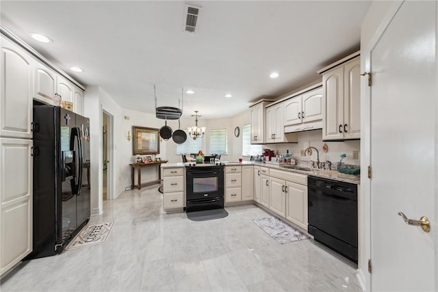 3532 Fairway Ct, Blairsville Area, PA 15717 - kitchen with black appliances, a sink, a peninsula, recessed lighting, and hanging light fixtures
