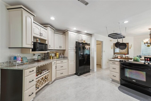 3532 Fairway Ct, Blairsville Area, PA 15717 - kitchen with black appliances, light stone counters, recessed lighting, a chandelier, and decorative light fixtures