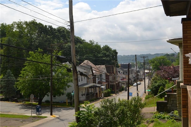 117 Grant Ave, Shaler, PA 15223 - view of asphalt road featuring curbs, sidewalks, and traffic signs